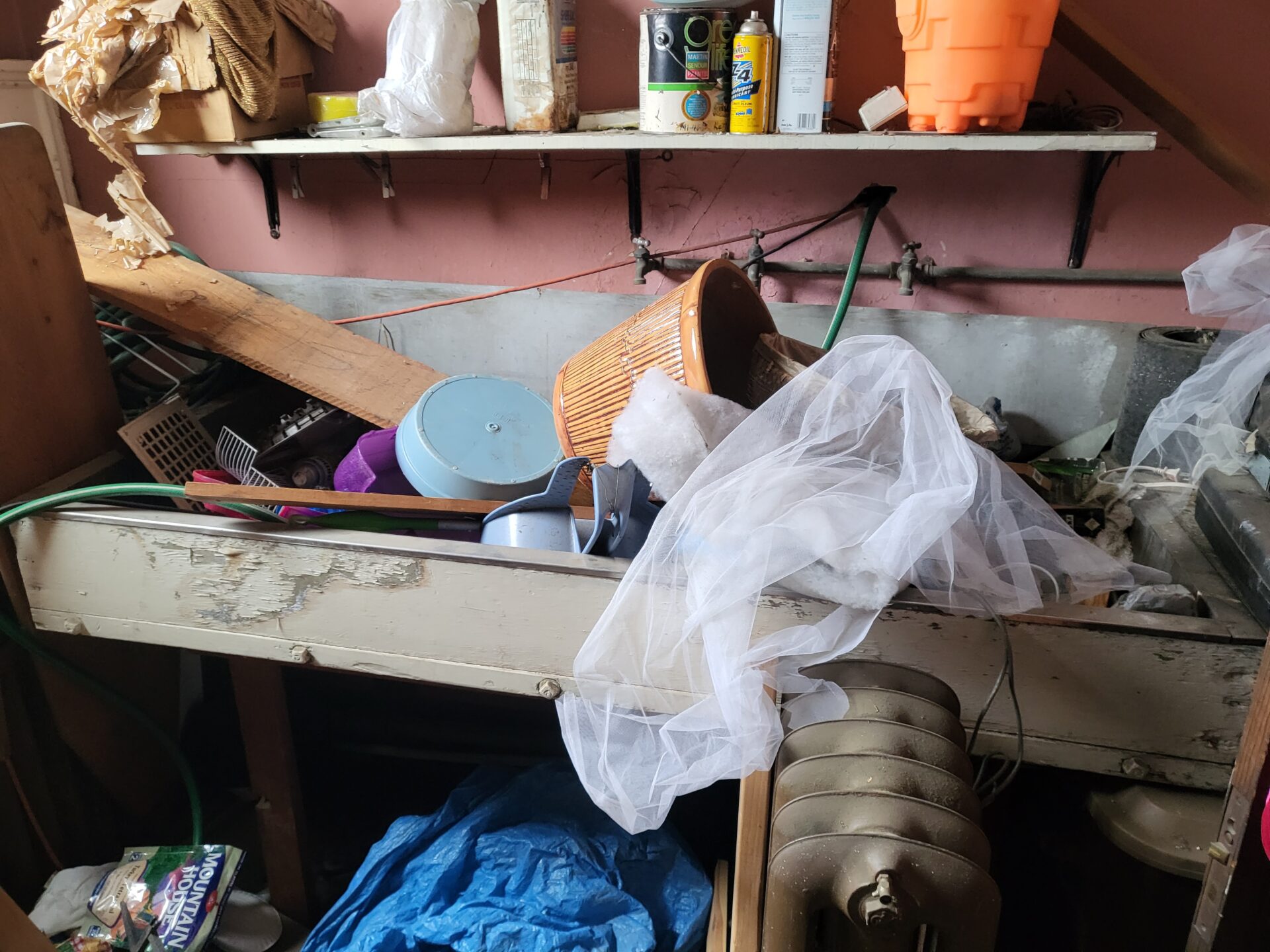 20230328_142646 Garage with unwanted household items