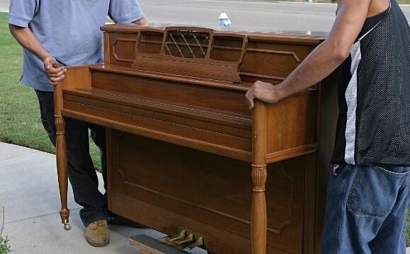Tips-For-Safe-Move-Of-A-Piano Garage with unwanted household items